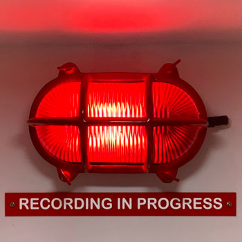 red recording studio light on air recording in progress